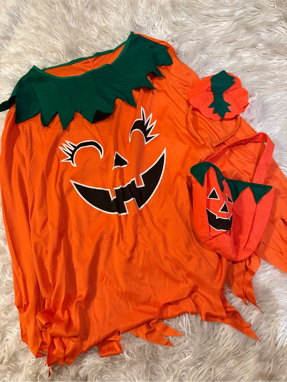 Women’s pumpkin poncho